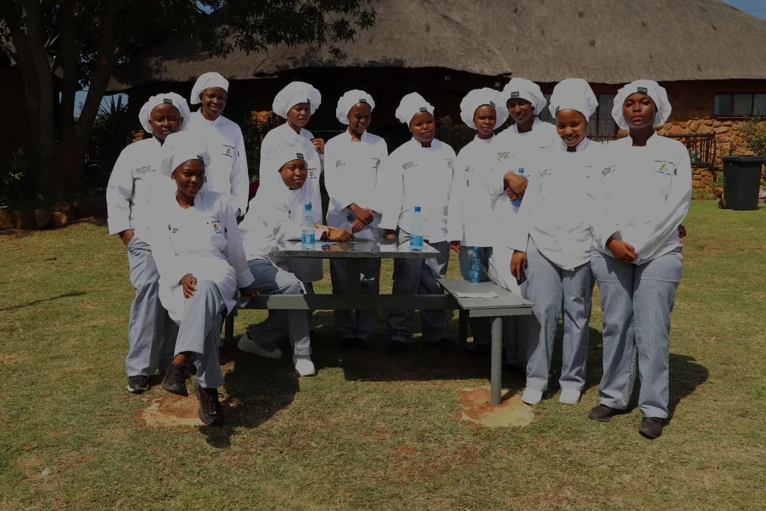 Students working with equipment in a college practical training workshop