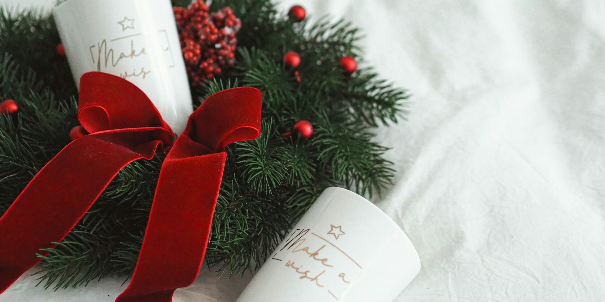 Christmas gift An image of two candles and Christmas decoration